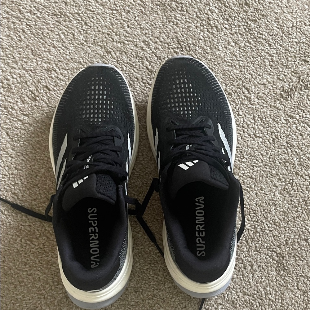 Adidas Supernova women’s Black and White Athletic Shoes